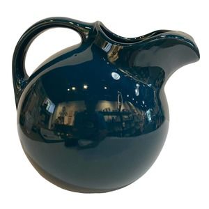 Hall pottery ball style green ceramic pitcher